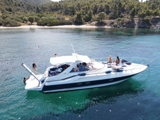 Pefkochori Motor Yacht Sunseeker White Eagle Cruises alt tag text