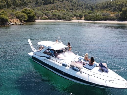 Pefkochori Motor Yacht Sunseeker White Eagle Cruises alt tag text