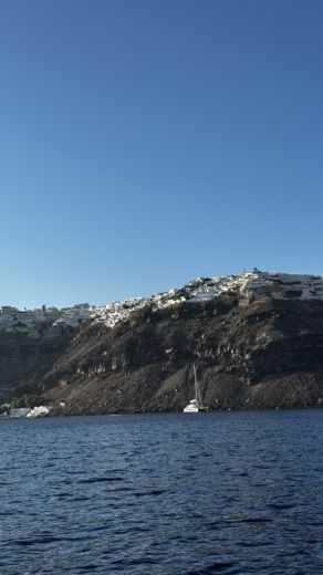 Santorin Without license SANTORINI BLACK BOAT alt tag text